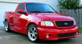 2004_ford_f-150_svt_lightning_2_dr_supercharged_standard_cab_stepside_sb-pic-2641.webp